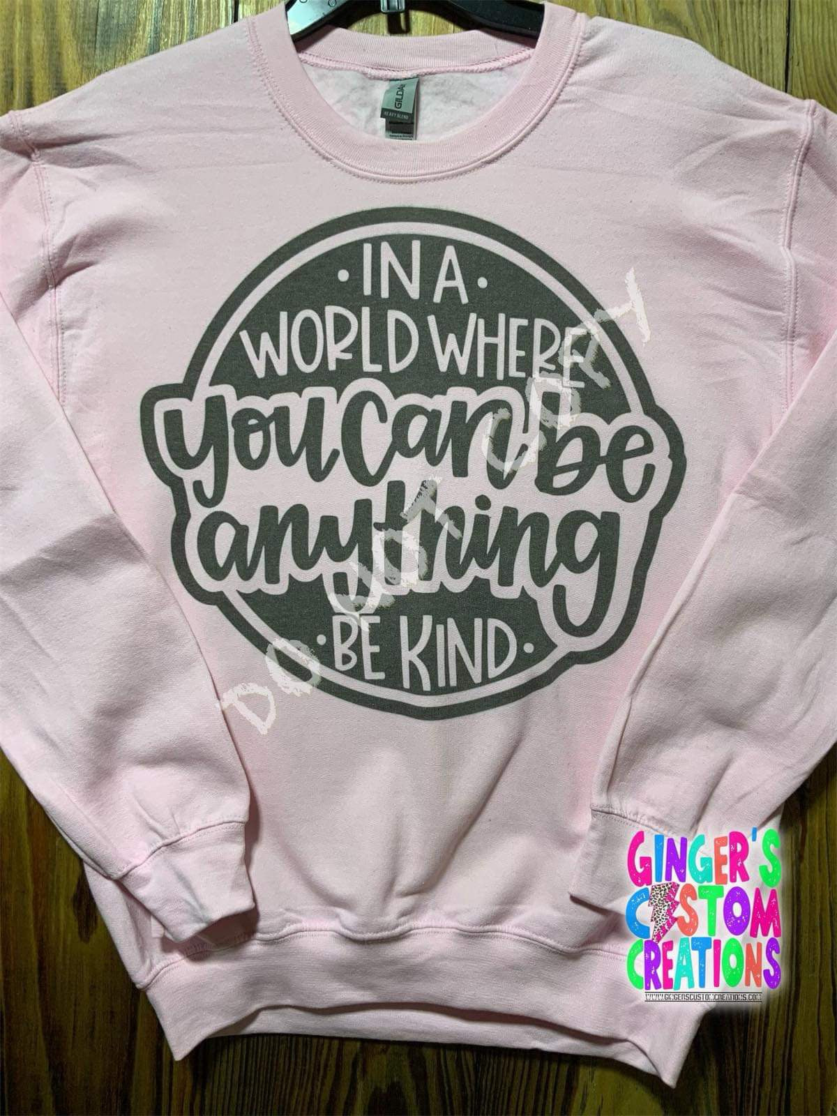 IN A WORLD WHERE YOU CAN BE ANYTHING BE KIND CREWNECK